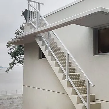 Modern aluminum stair railing by RailFX