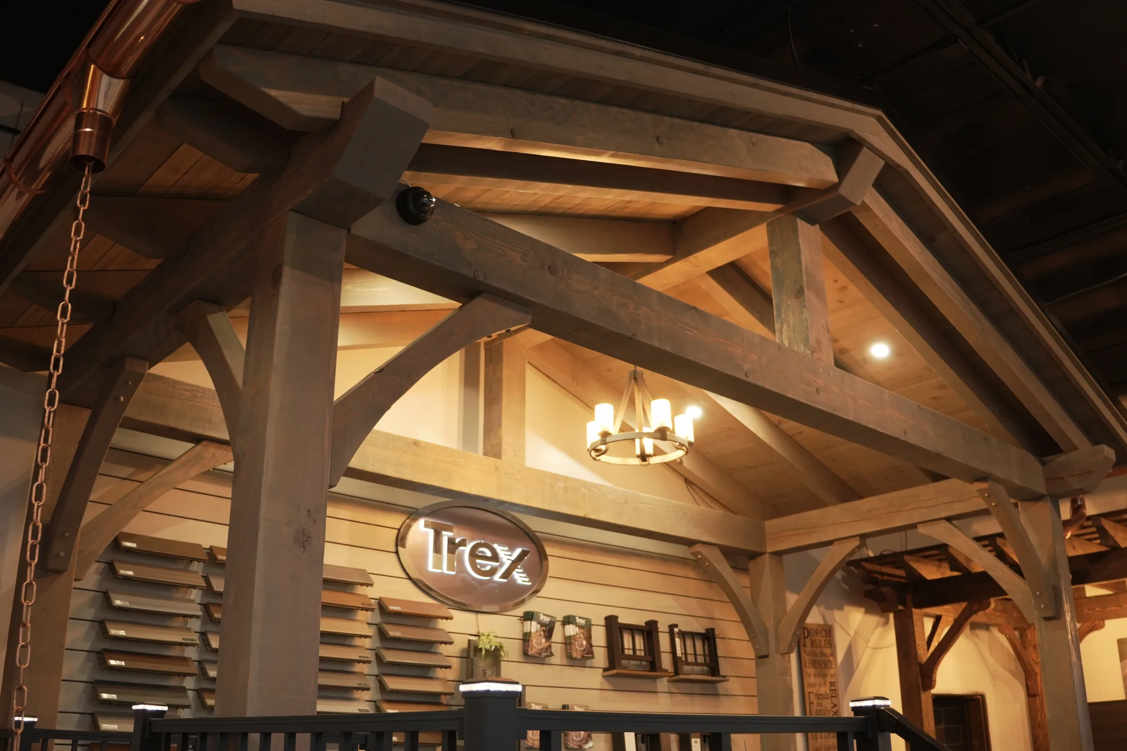 Timber frame pavilion with solid roof and outdoor dining